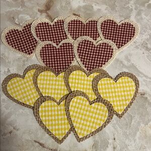 12 heart-shaped fabric appliques made with red and yellow gingham and burlap